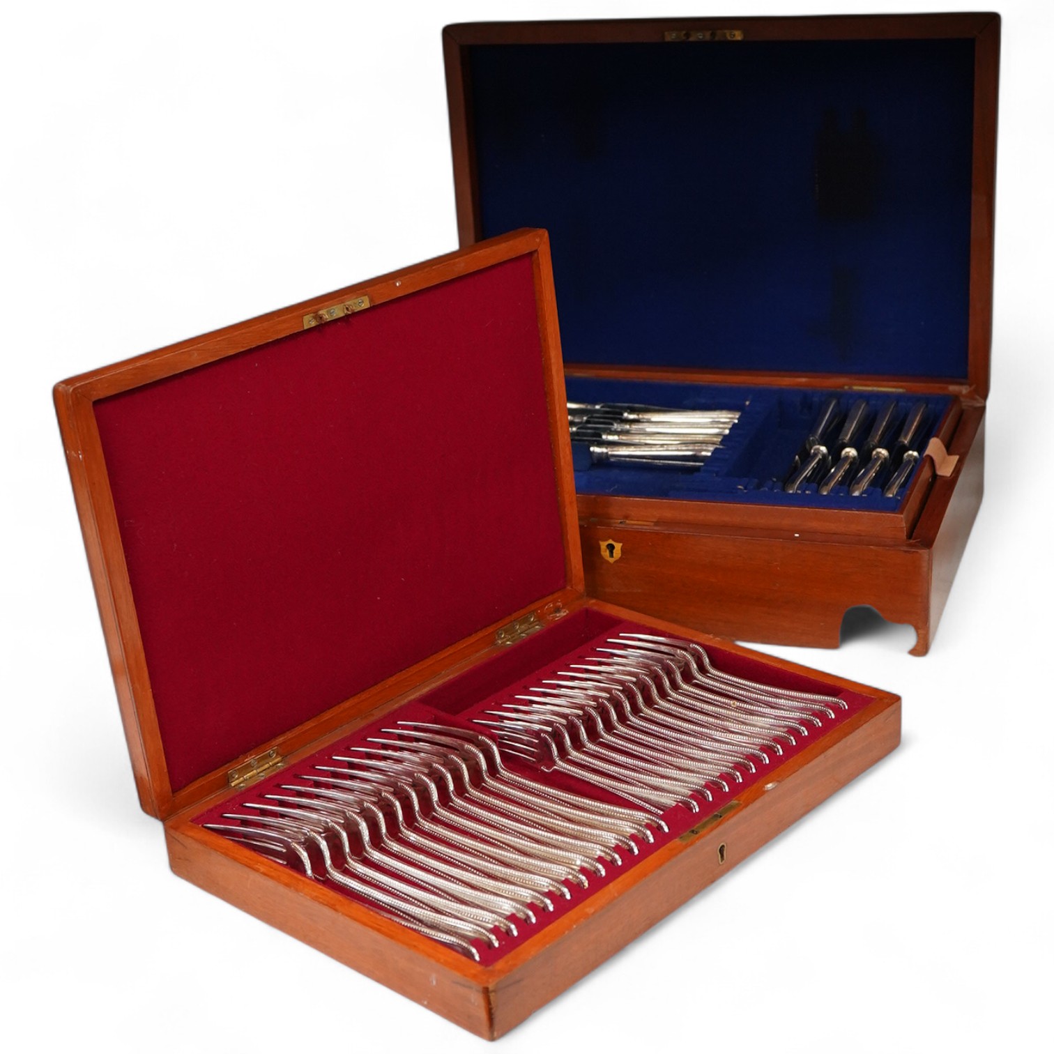 A plated bead edged part canteen of cutlery housed in two cases